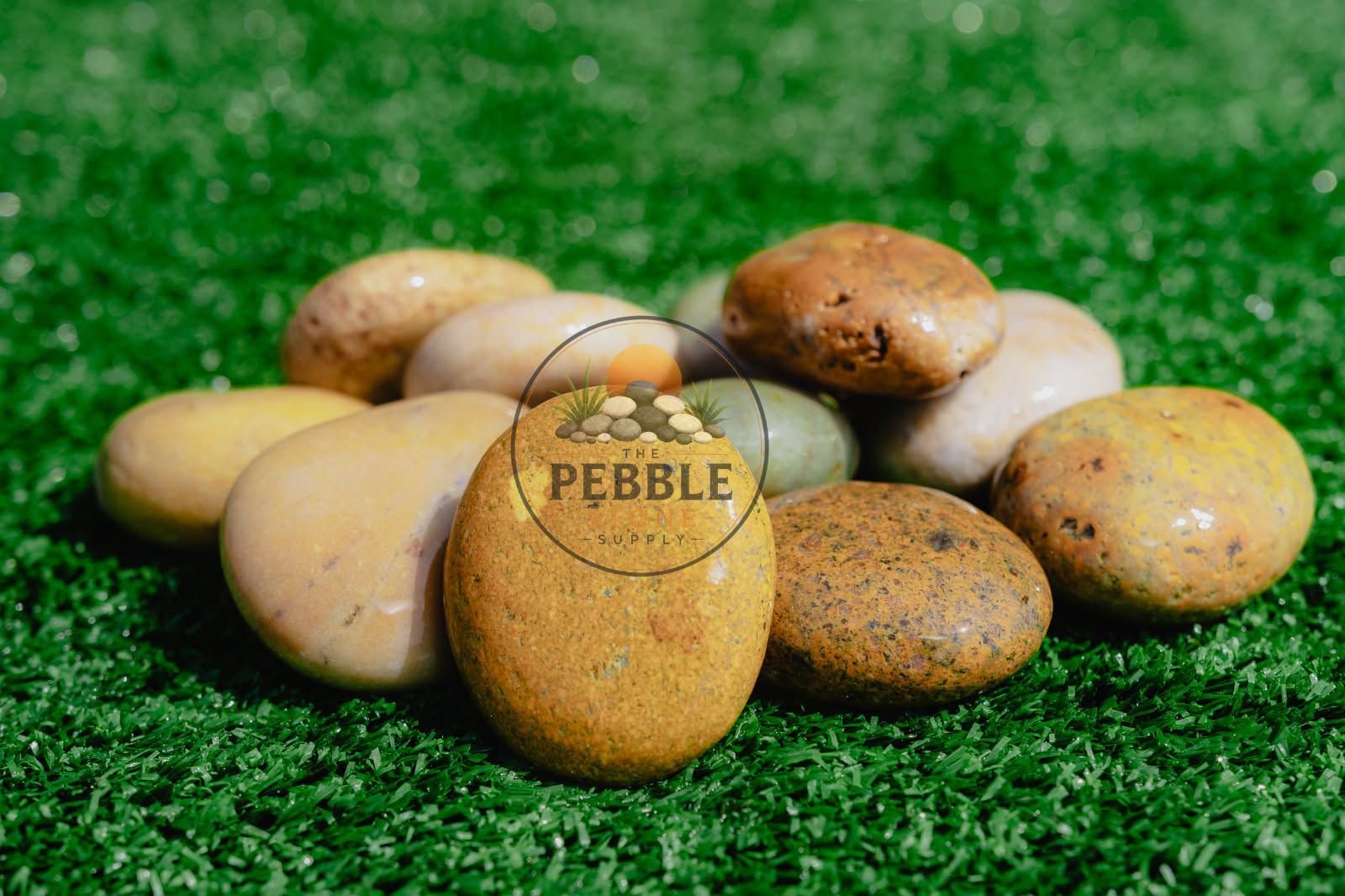 Tan pebble stones for natural landscaping projects